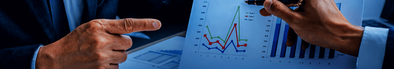 Finance Leaders examining financial reports